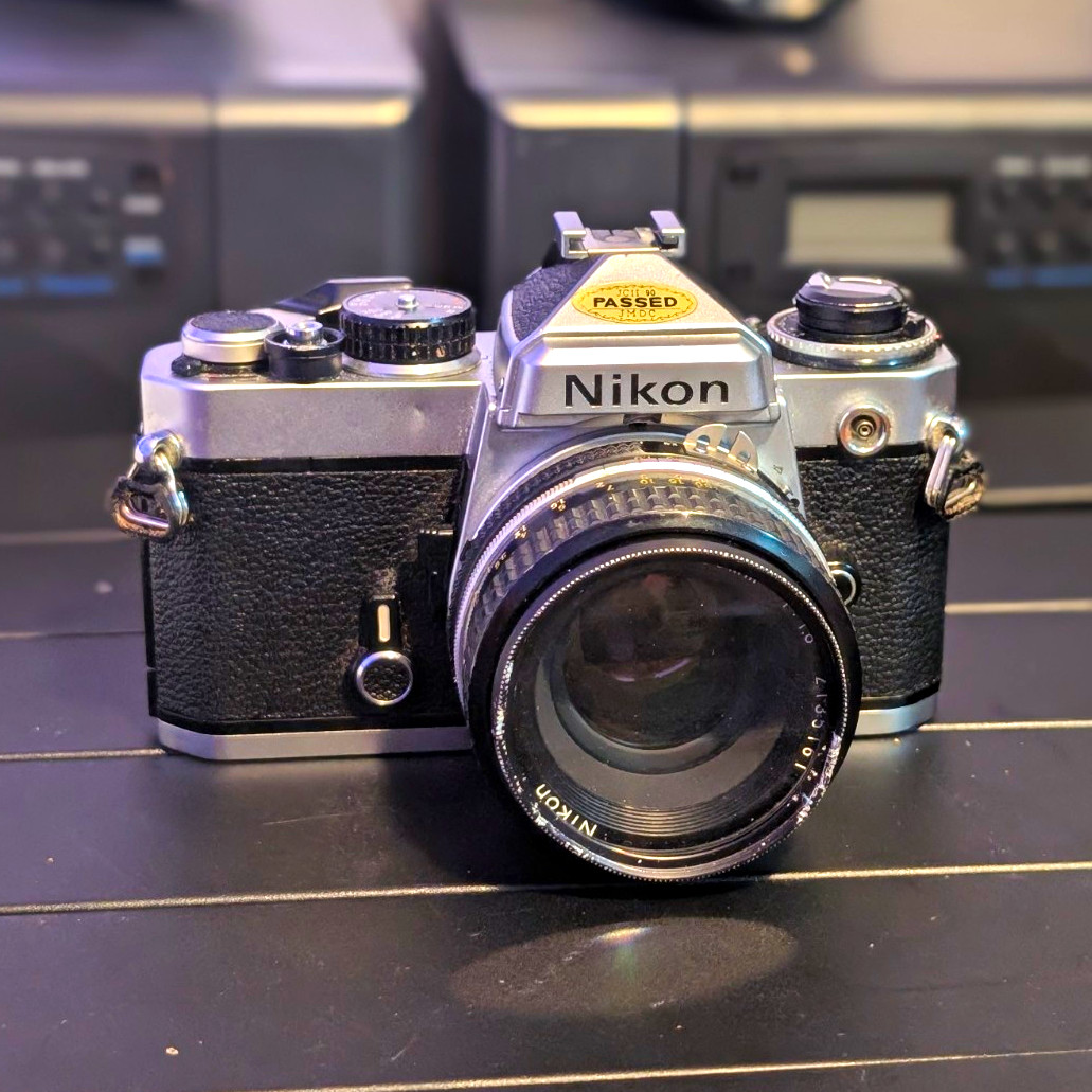 Nikon FE Silver/Black 35mm SLR Film Camera w/ Nikon Lens 50mm